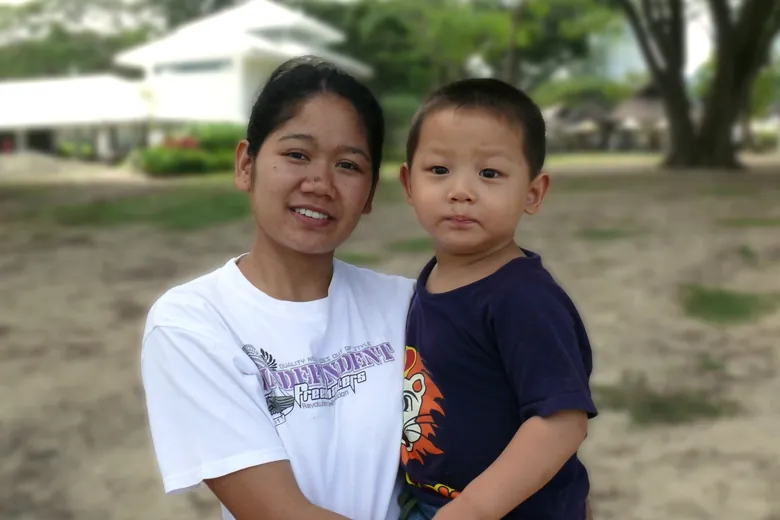 Nanyang Maids helper caring for a young child